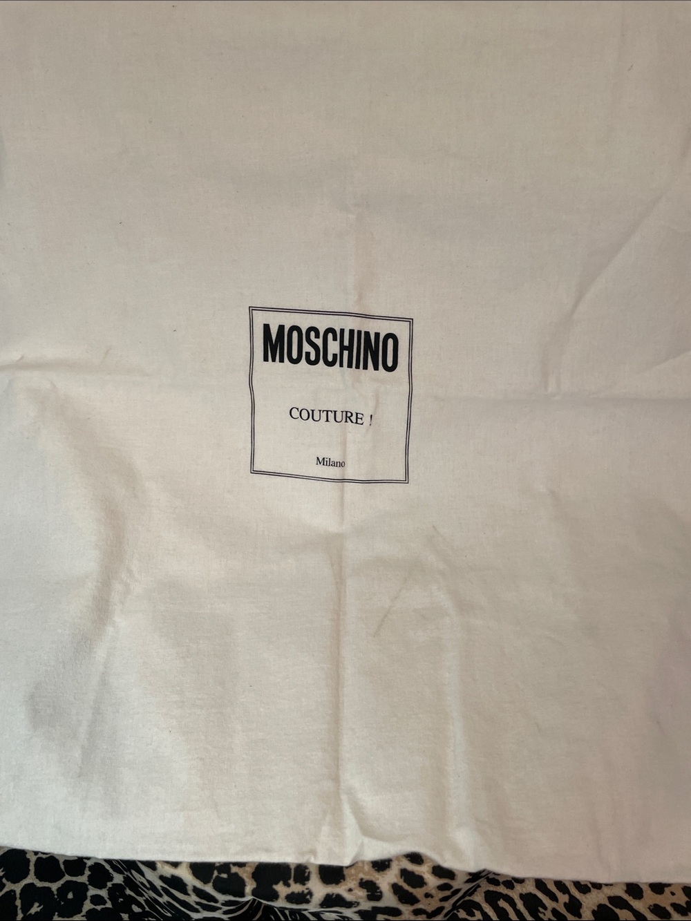 Moschino Cream Dust Bag with Black Logo Print
